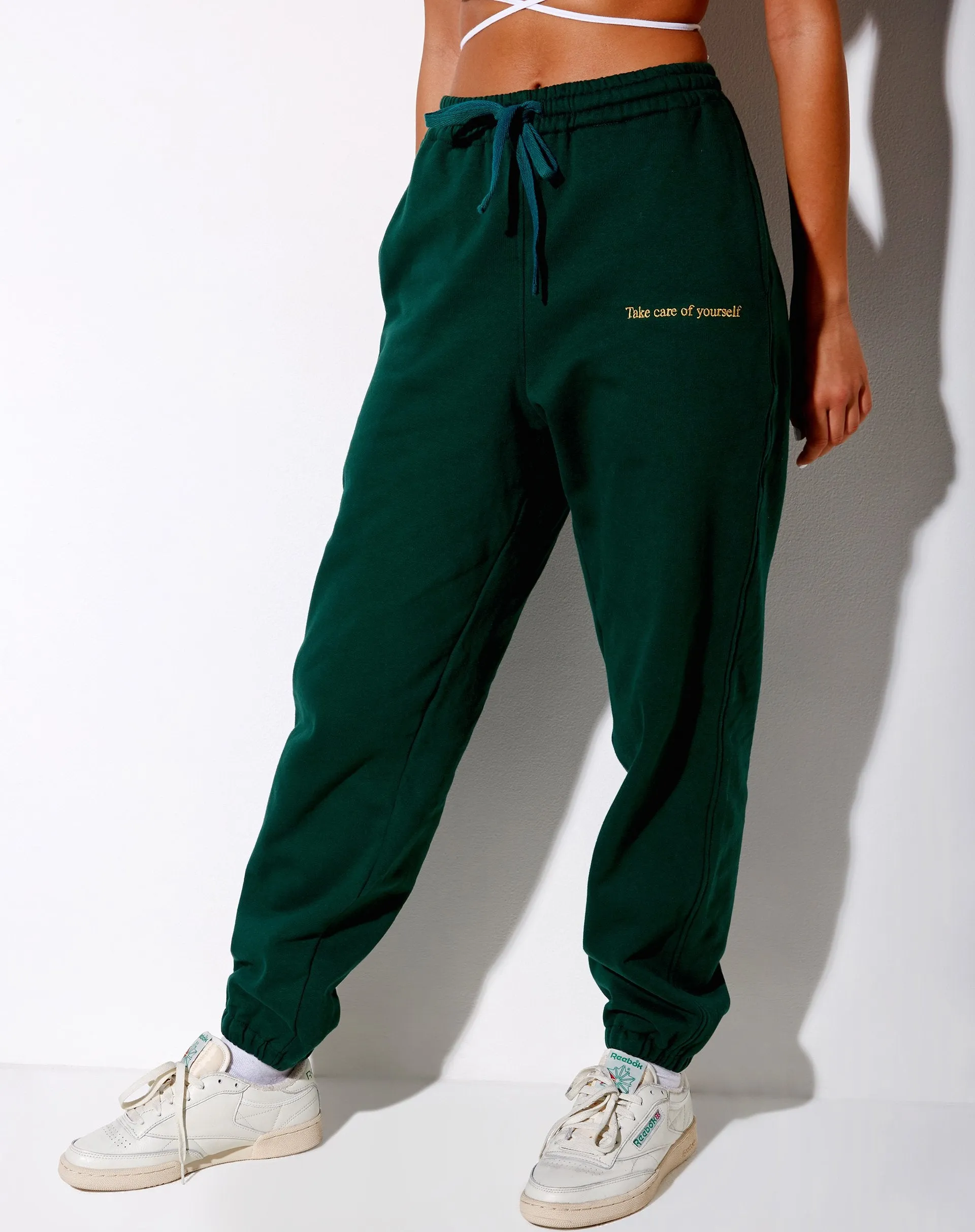 Basta Jogger in Bottle Green with 'Take Care Of Yourself' Embro