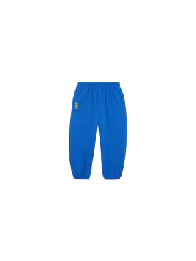 Pangaia x Haroshi BE@RBRICK™ Kids Track Pants—cobalt blue