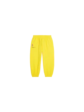 Pangaia x Haroshi BE@RBRICK™ Kids Track Pants—saffron yellow