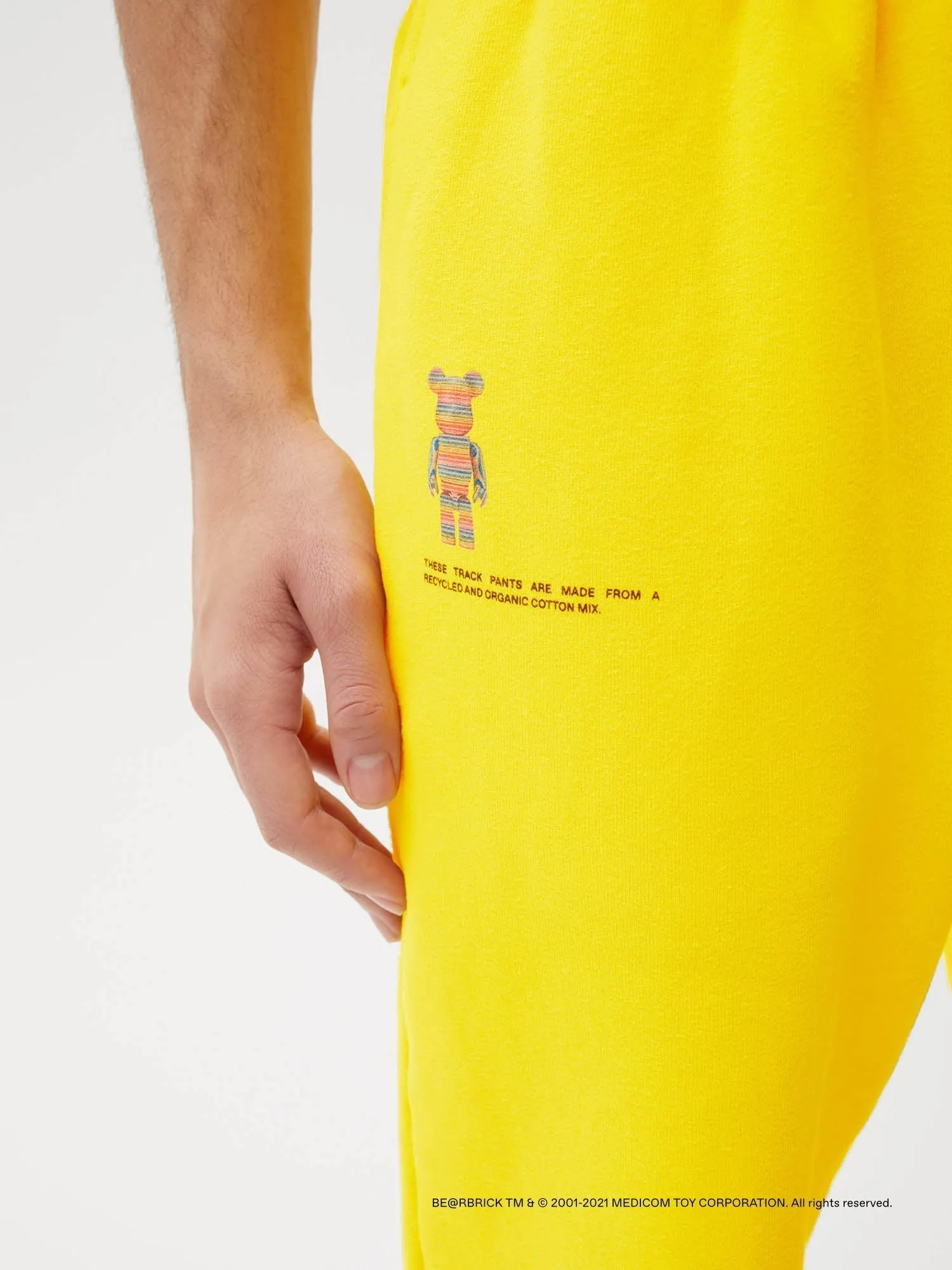 Pangaia x Haroshi BE@RBRICK™ Recycled Cotton Track Pants—saffron yellow