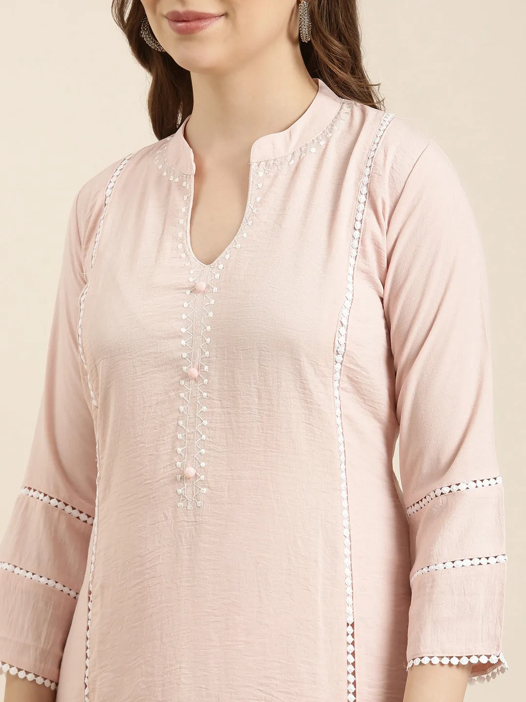 Women Straight Peach Solid Kurta and Trousers Set